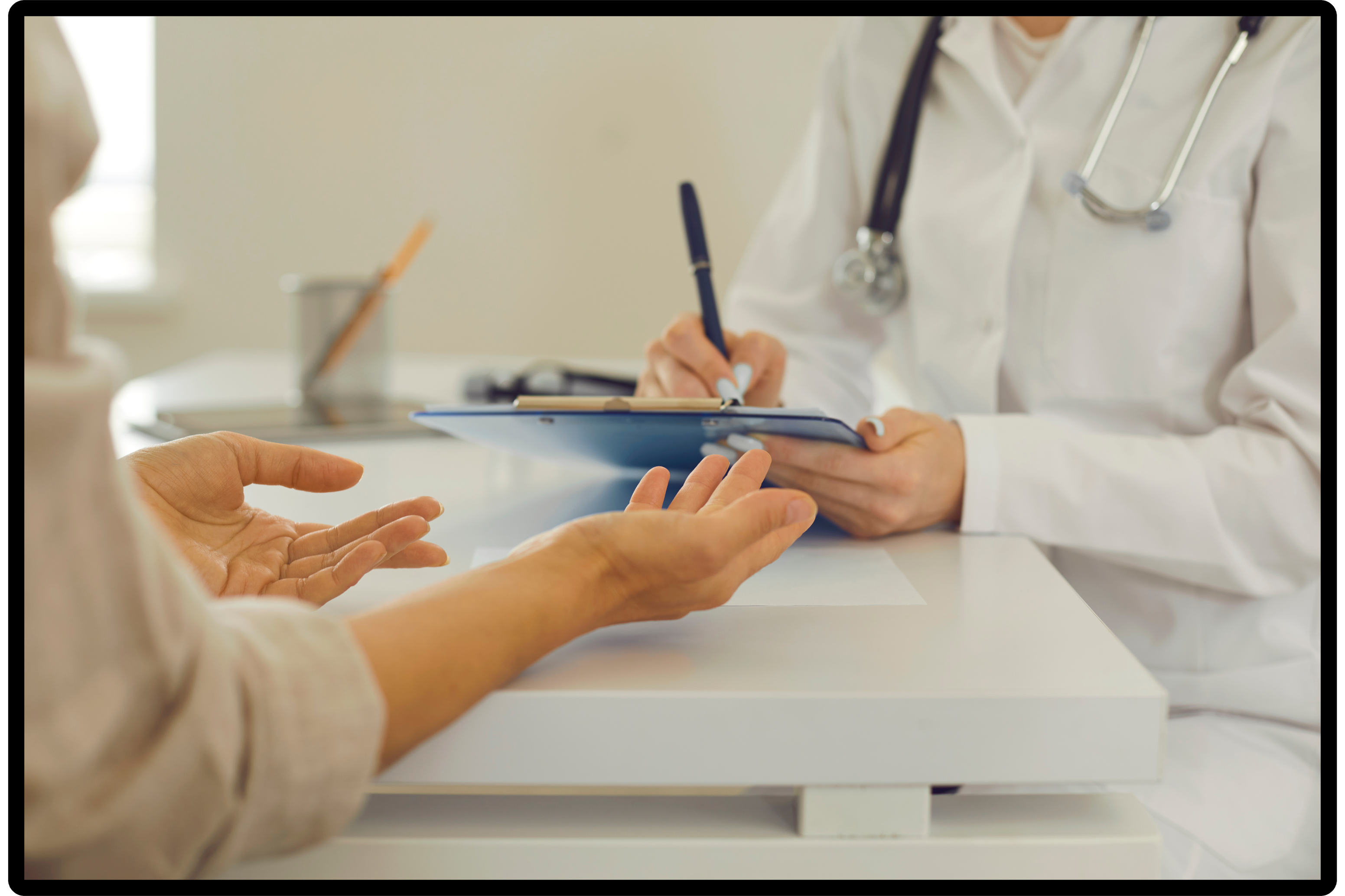 Female Doctor with Clipboard Listening to Patient and Writing down Her Health Complaints